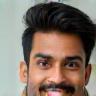 Smiling portrait photo of customer Rajesh V.